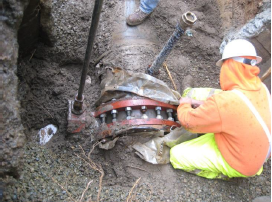 Crew Member Working on a Water Main Break